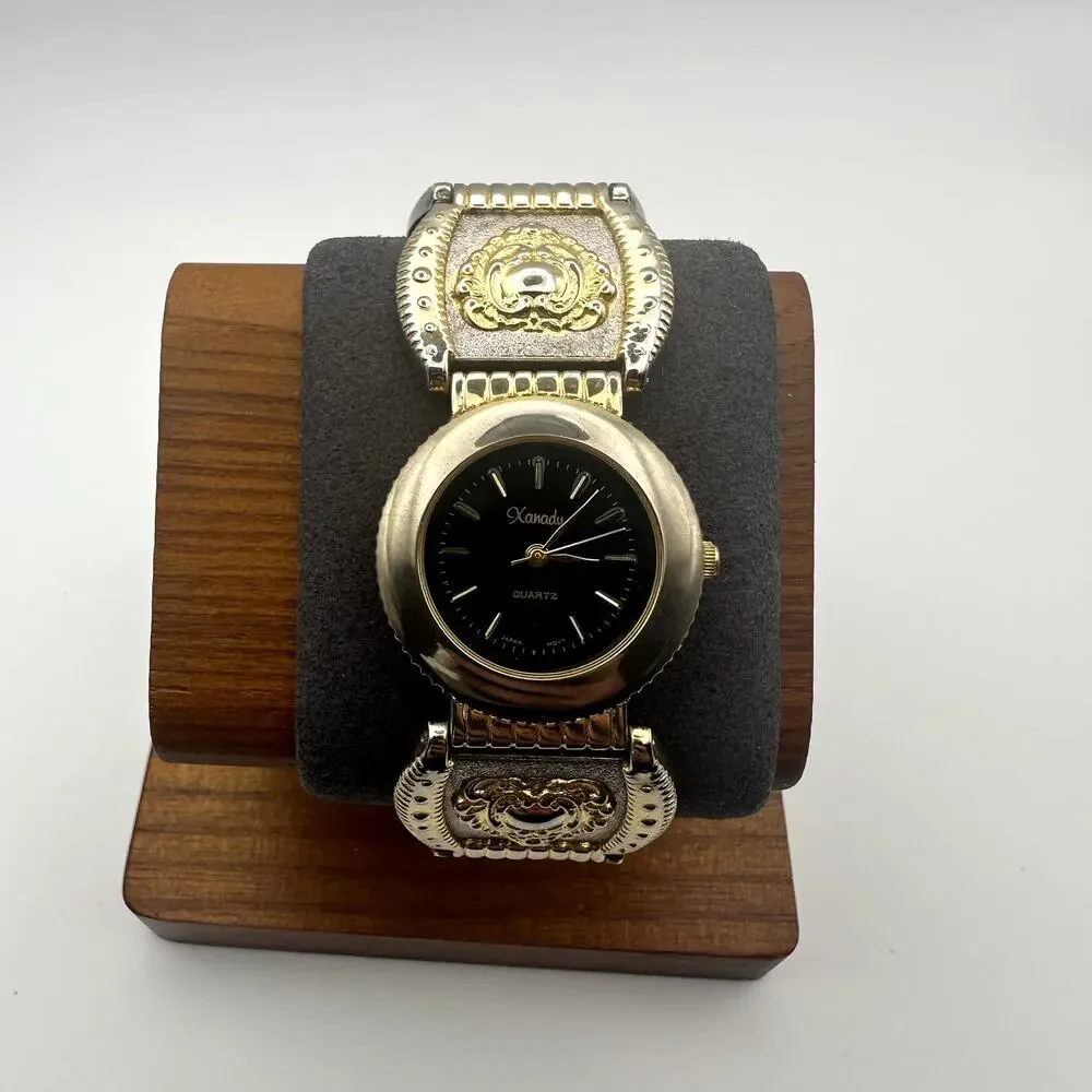 Xanadu Quartz Watch Two Tone Gold Silver Ornate Link Bracelet Black Dial